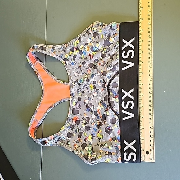 Victoria Secrets sports bra. Size M Gray with multiple colors design.  Excellent - Picture 1 of 9
